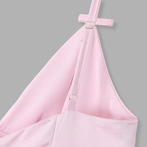 Pink apron with a gray background