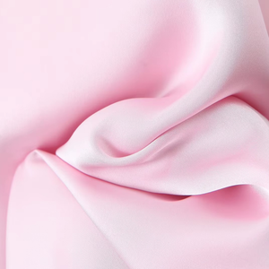 Close-up of pink fabric with a soft texture