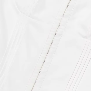 Close-up of a white fabric with subtle texture