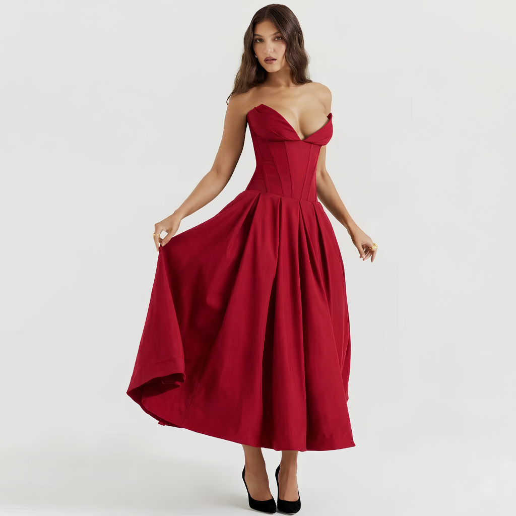 Red strapless dress worn by a model on a white background