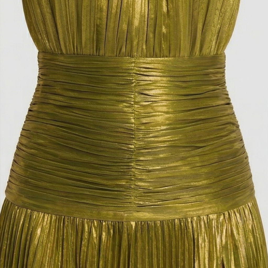 Green pleated dress on a white background