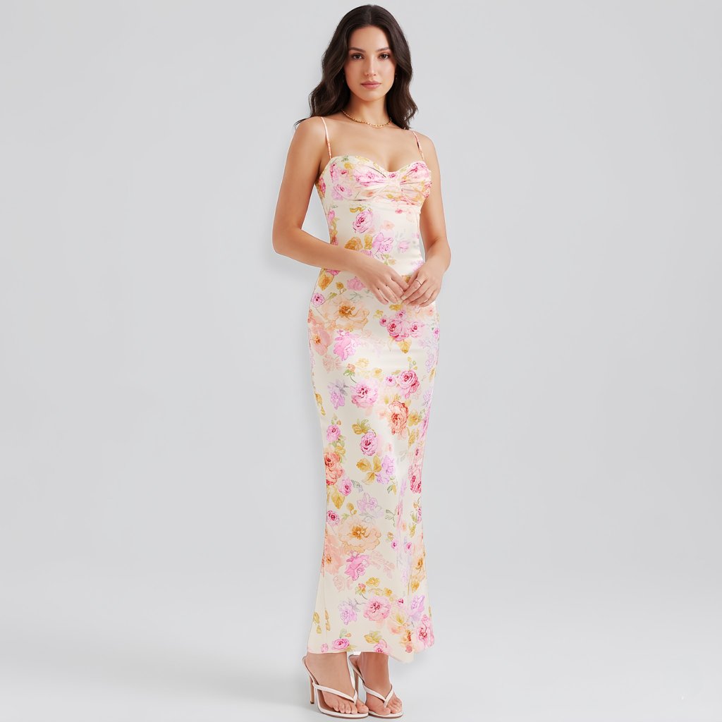 Woman wearing a floral dress on a gray background