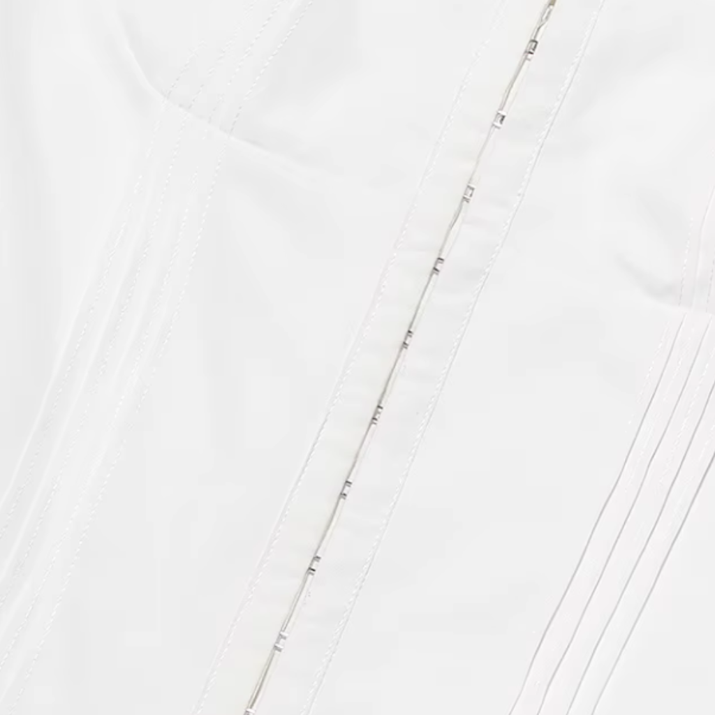 Close-up of a white fabric with subtle texture
