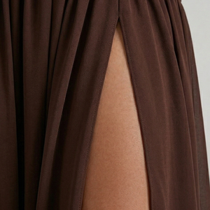 Brown fabric draped over a neutral background