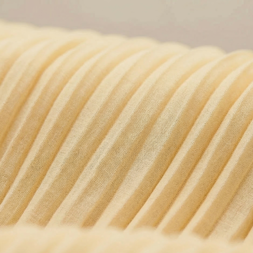 Close-up of beige ribbed fabric texture
