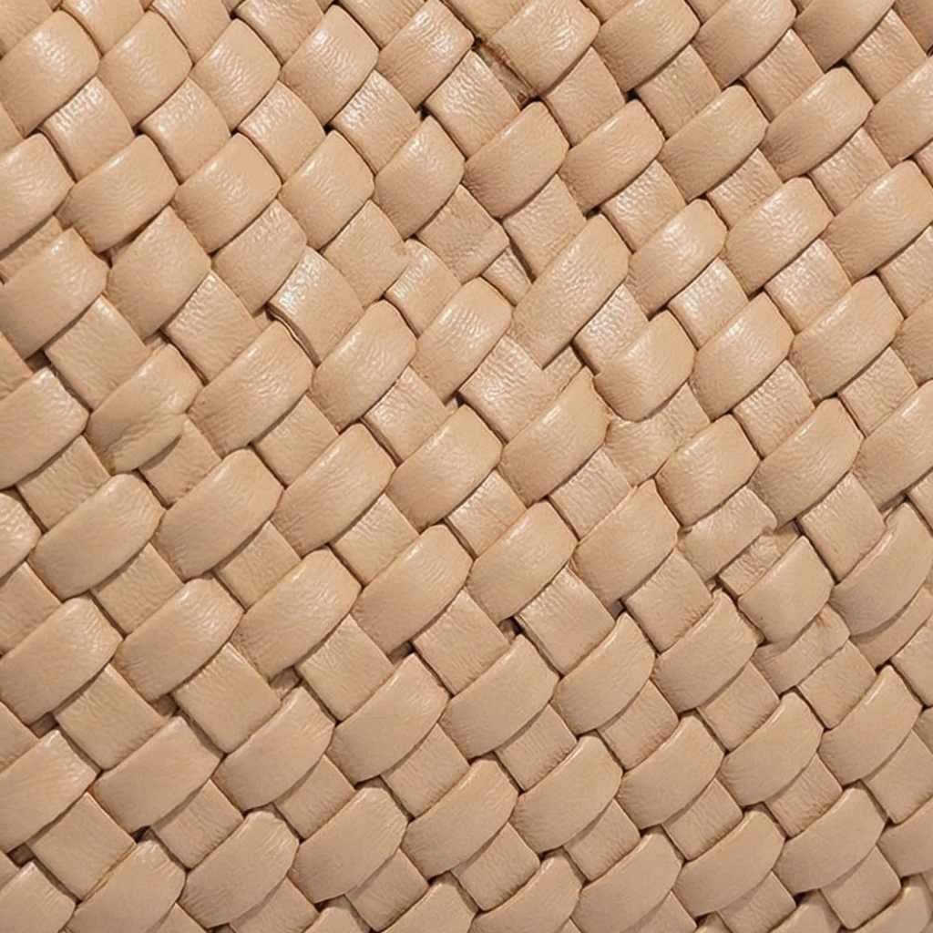 Close-up of beige woven leather texture