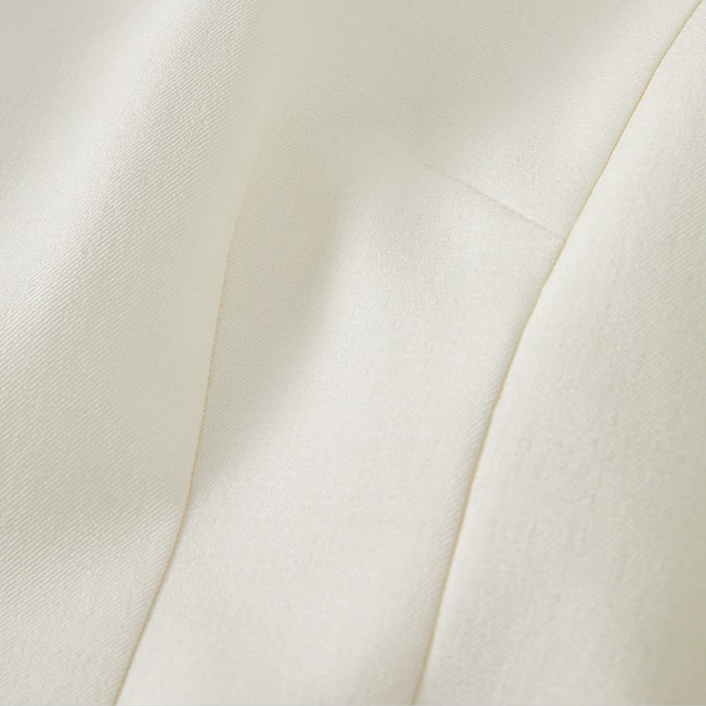 Close-up of a textured white fabric surface